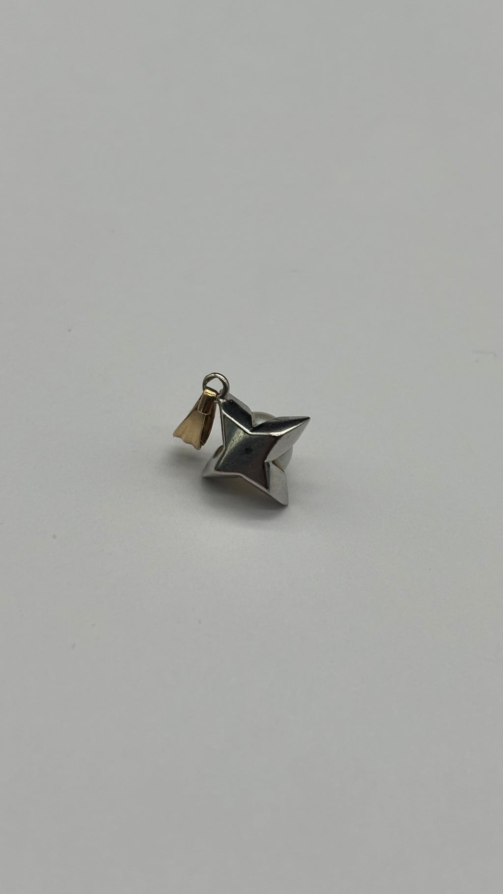 Back of 10k solid gold pearl and diamonds star charm