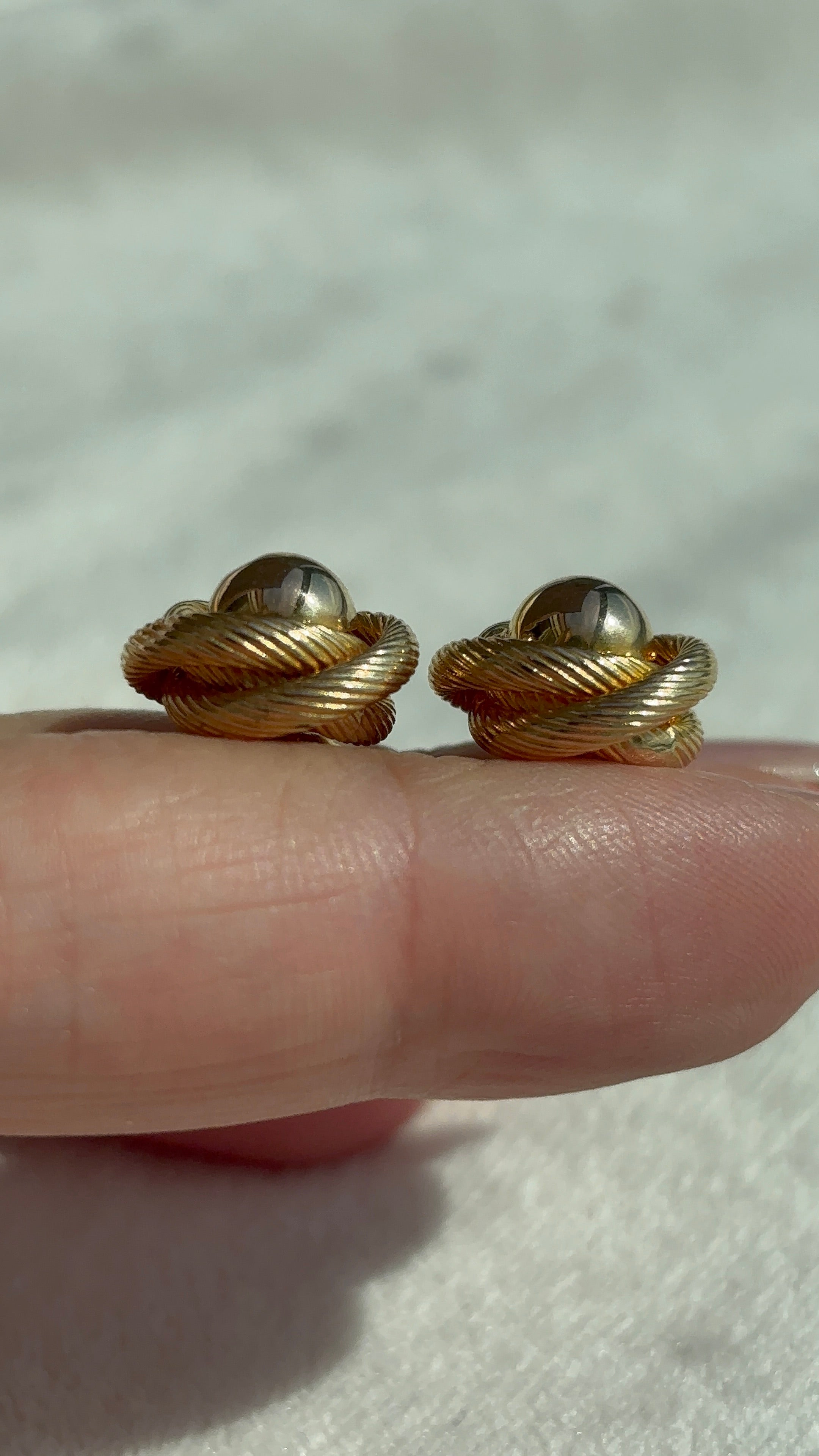 10k Solid Gold Knot Ball Earrings close-up showing textured detail and earring depth