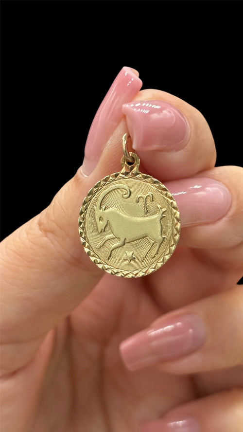 Front of 10k solid gold Aries medallion charm