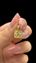 Front of 14k solid gold square Leo pendant with fixed bail