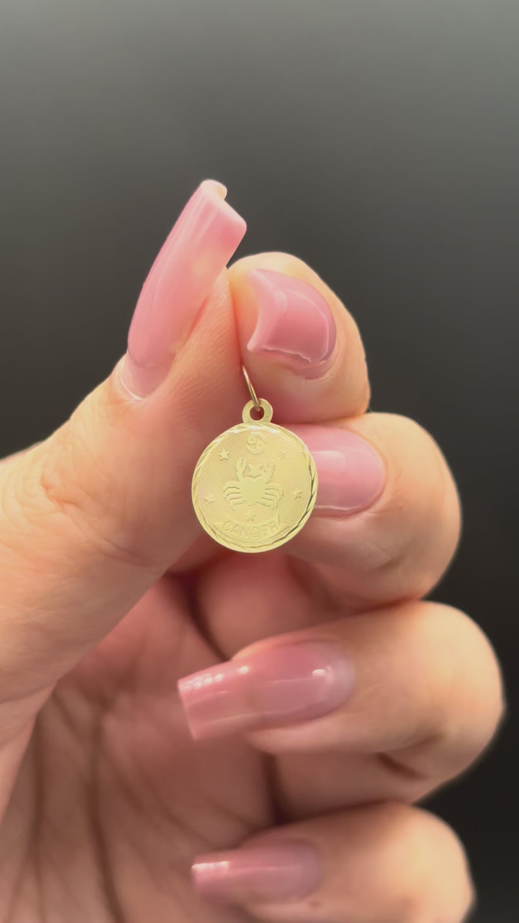 14k solid gold circular Cancer charm moving side to side
