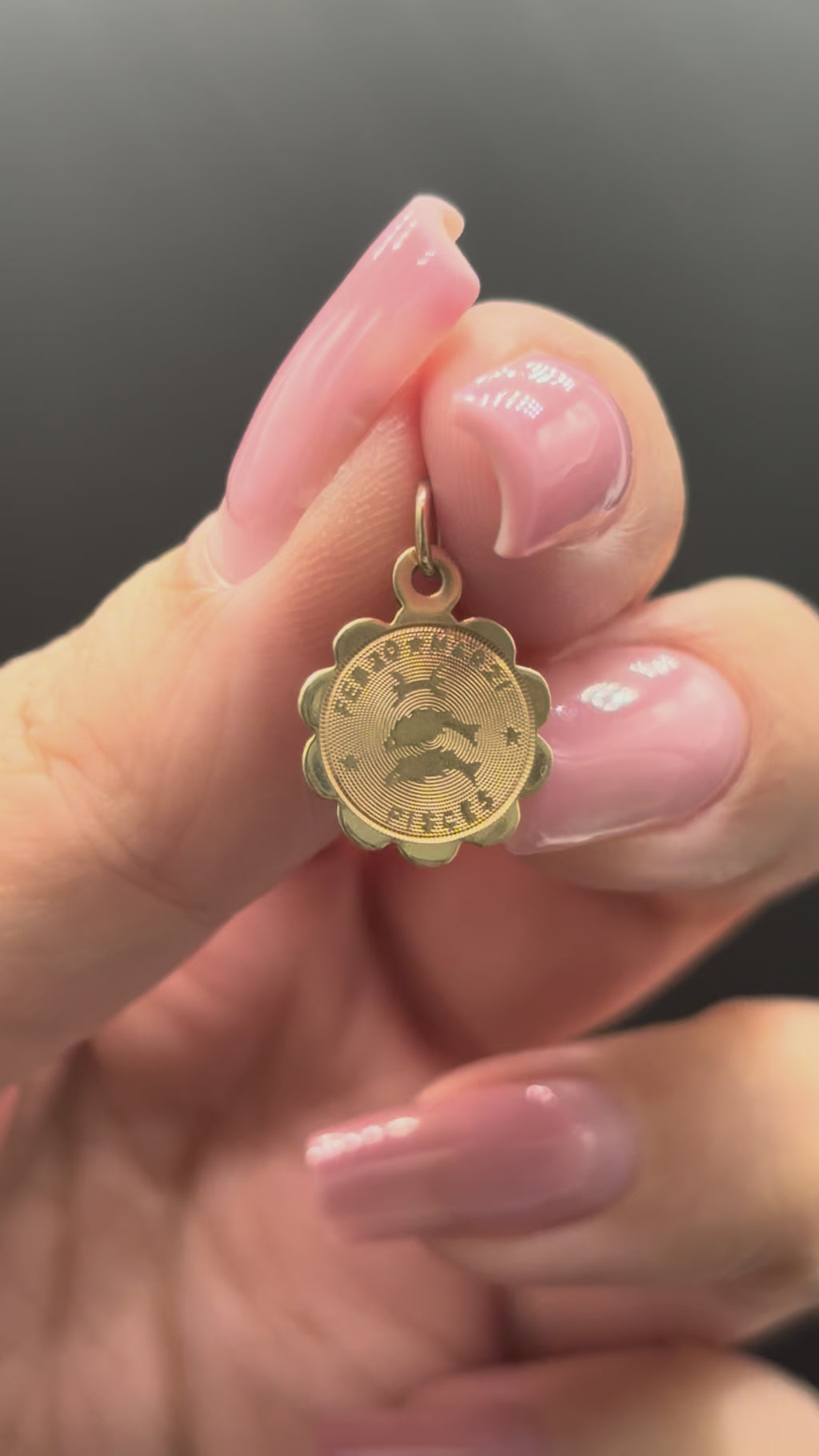 10k solid gold Pisces charm with scalloped edge moving side to side