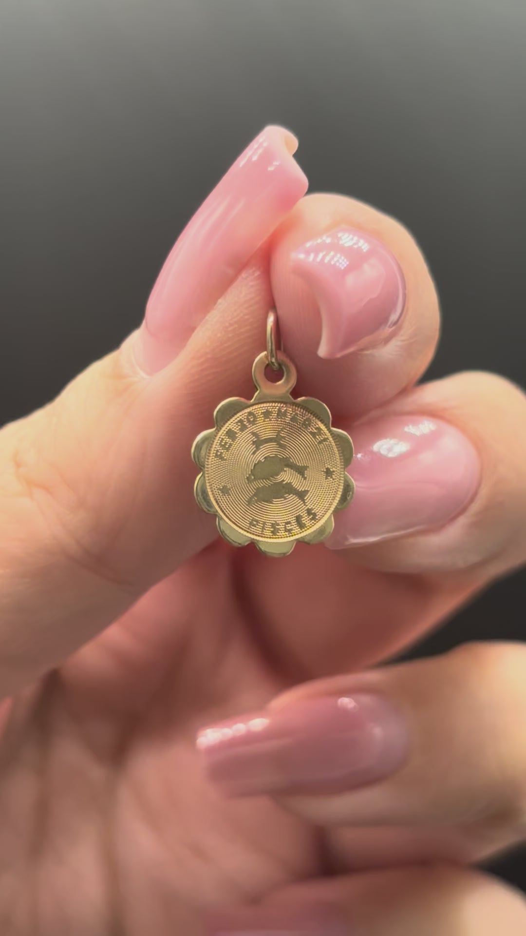 10k solid gold Pisces charm with scalloped edge moving side to side