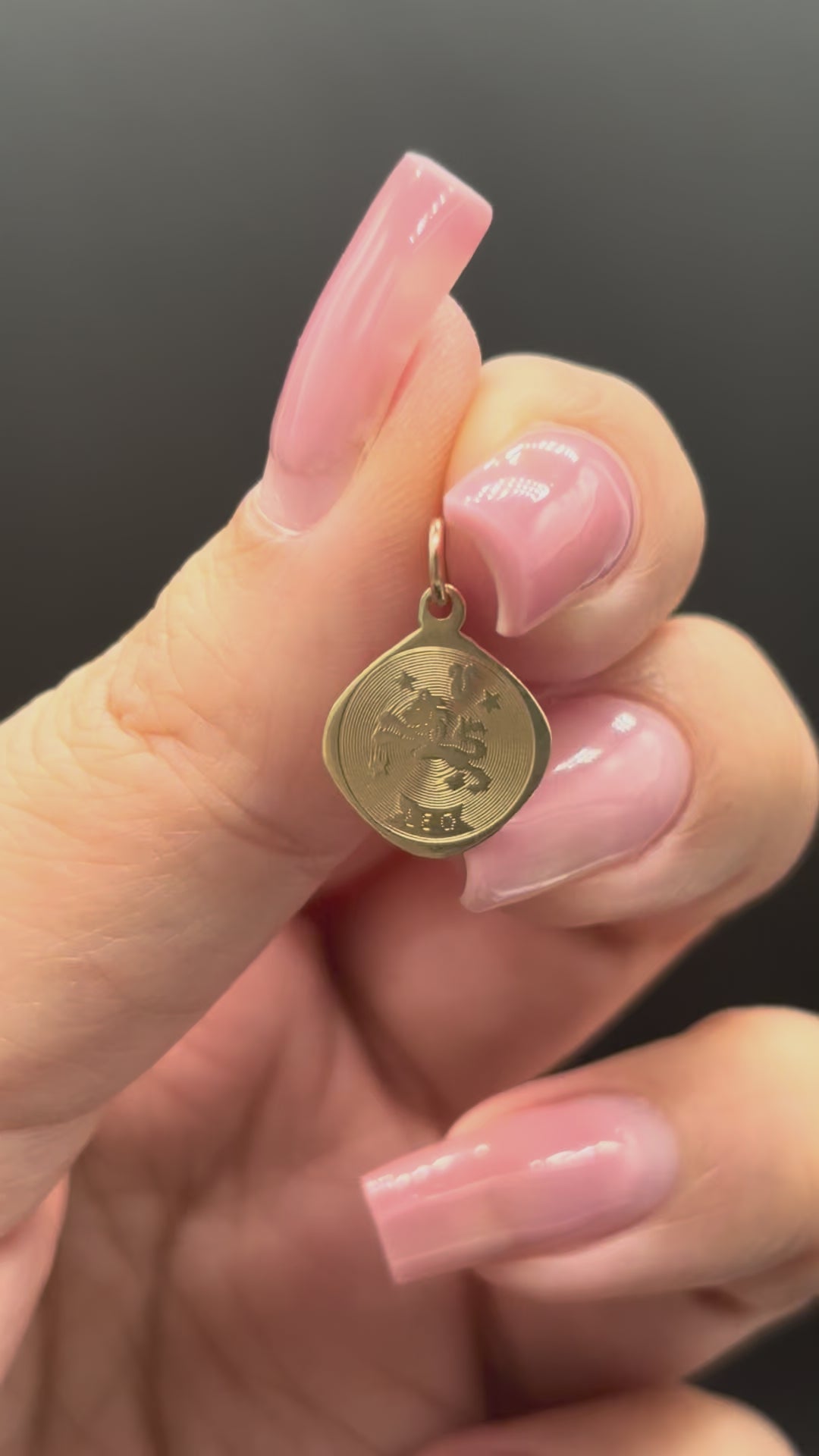 10k solid gold Leo charm moving side to side