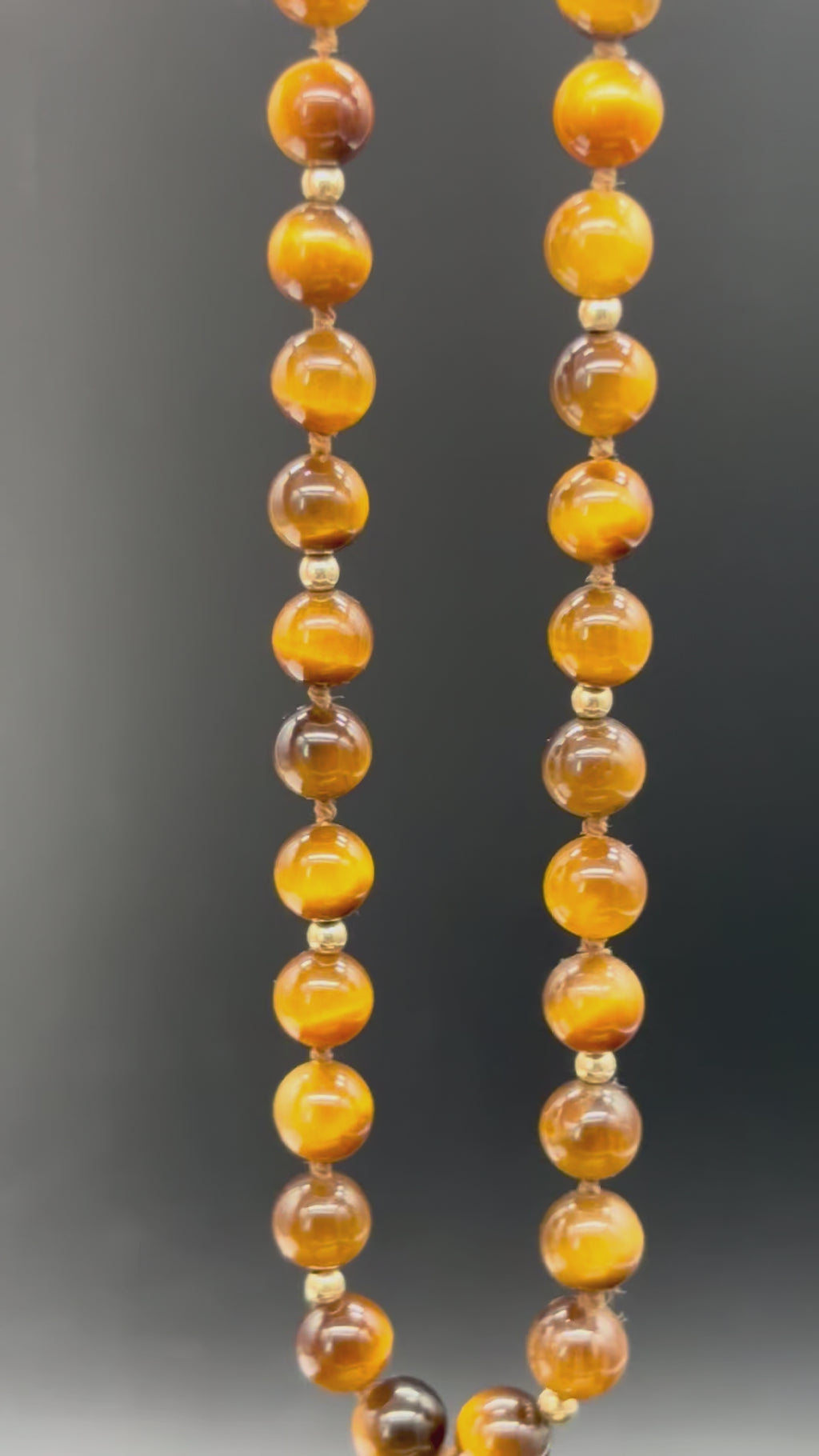 14k solid gold tiger’s eye stone strand necklace close-up showing bead detail