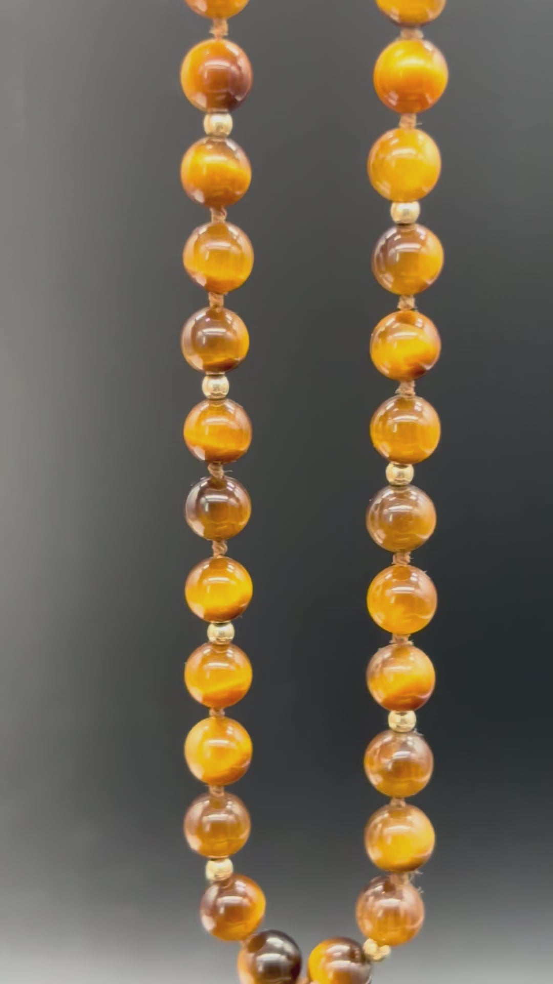 14k solid gold tiger’s eye stone strand necklace close-up showing bead detail