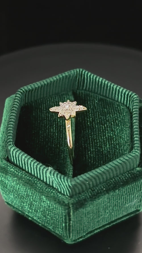 Rotating 10k solid gold figural diamond star motif ring in green box