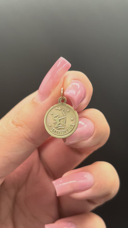 10k solid gold Sagittarius charm moving side to side