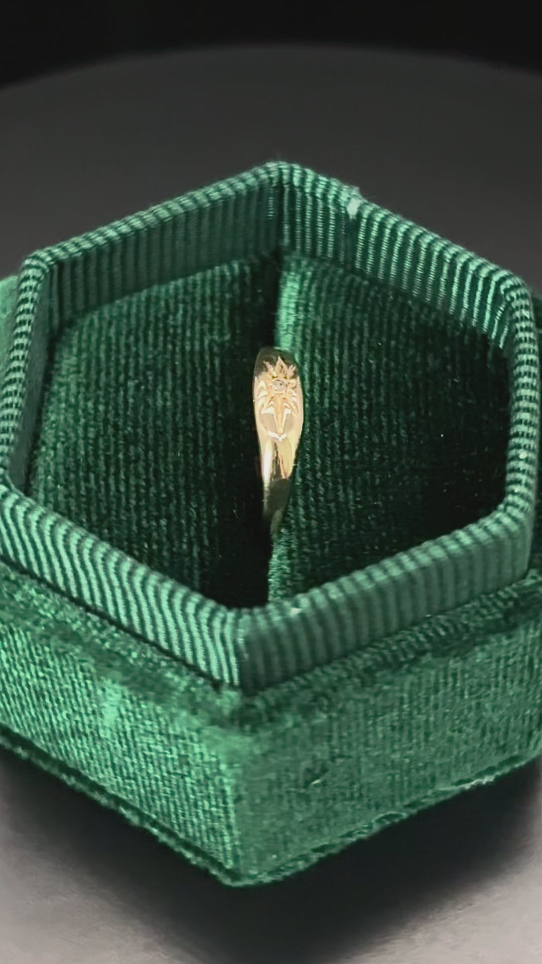 Rotating 10k solid gold star set diamond baby ring in green box